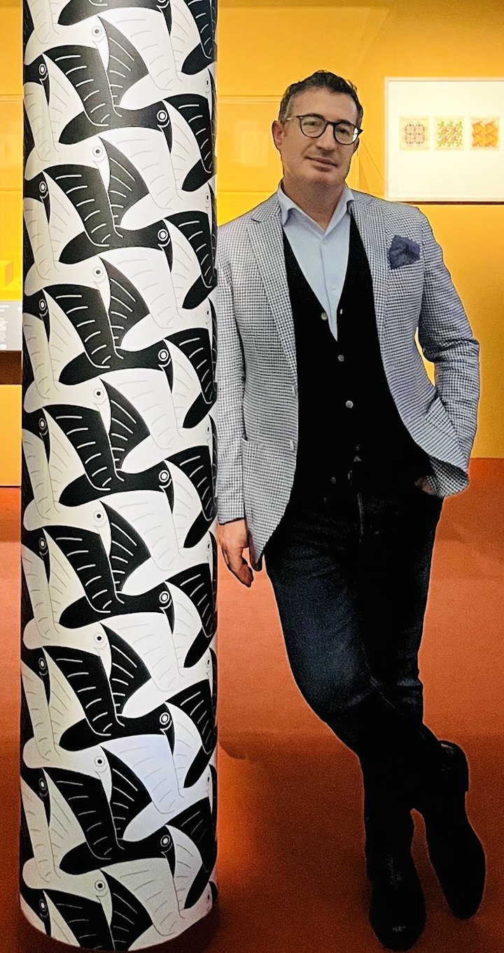 Karim Varini at an M. C. Escher exhibition